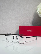 Eyeglasses with dark rectangular frames and clear lenses, front view.