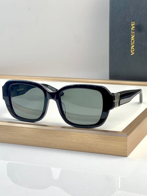 Balenciaga square-frame sunglasses with dark blue frames and green-tinted lenses