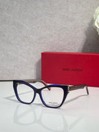 Navy eyeglasses with clear lenses and gold-tone hinge detail