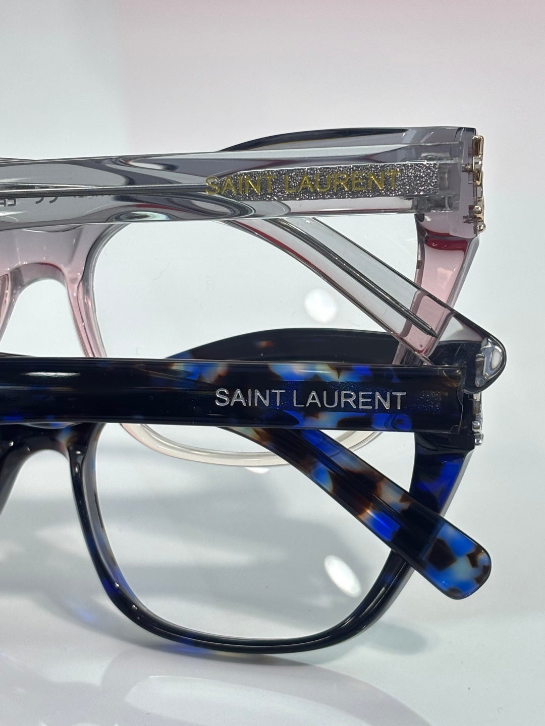 Blue eyeglasses side view with SAINT LAURENT logo on temple bar