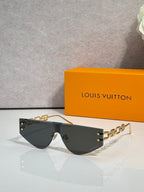 Louis Vuitton sunglasses with black tinted lenses and gold-tone chain temples