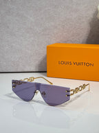 Louis Vuitton sunglasses with dark purple gradient lenses and gold-tone chain temples