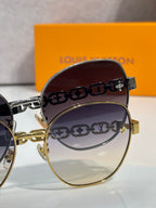 Louis Vuitton round sunglasses with printed logo lenses and gold frame