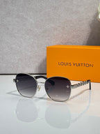 Louis Vuitton gold-tone sunglasses with dark gray gradient lenses