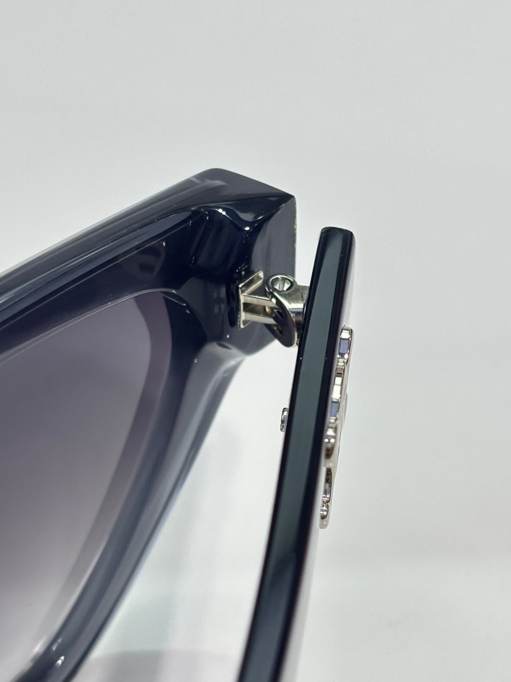 Celine sunglasses side view with black frame and metal hinge detail