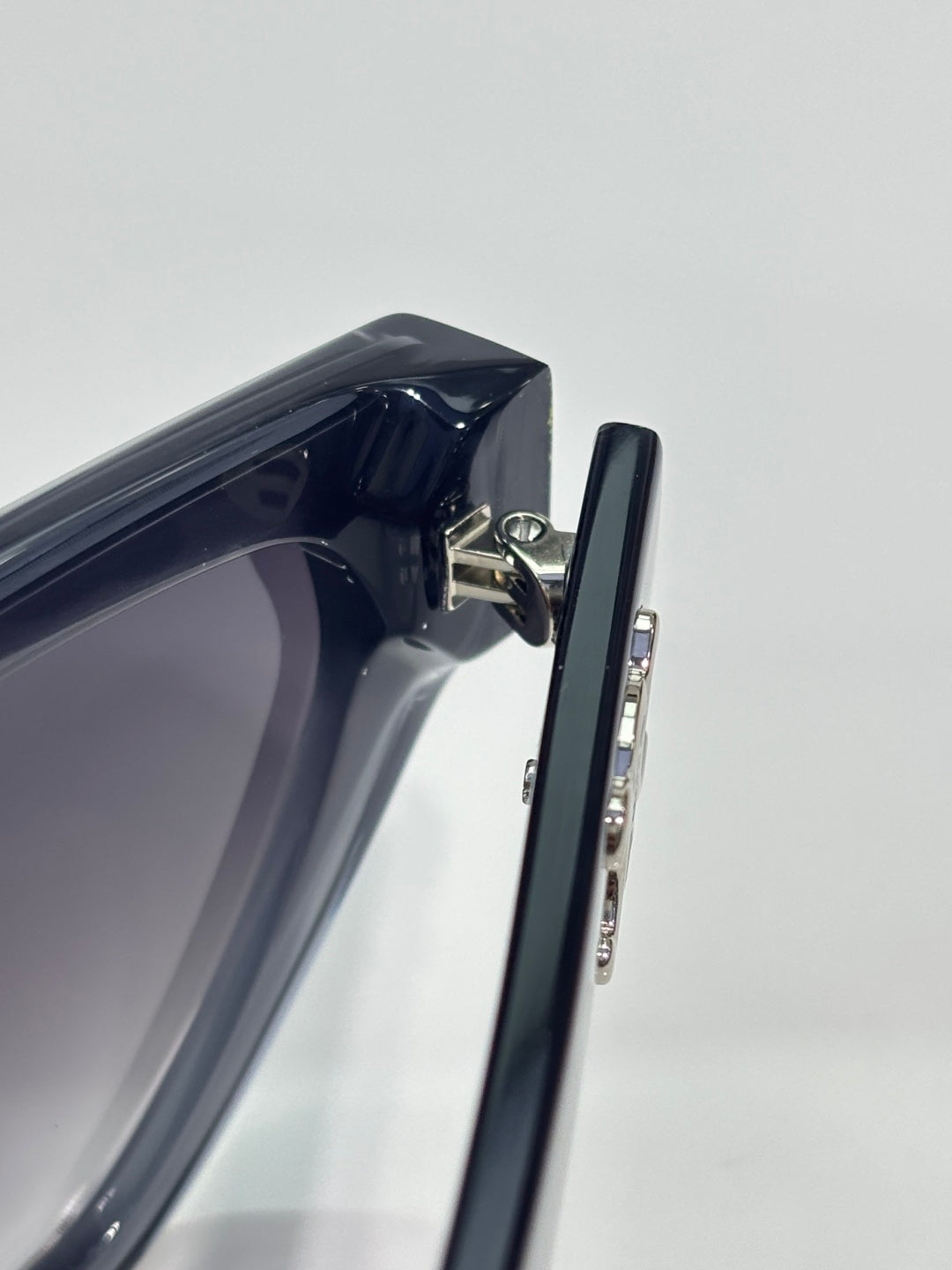 Celine sunglasses side view with black frame and metal hinge detail