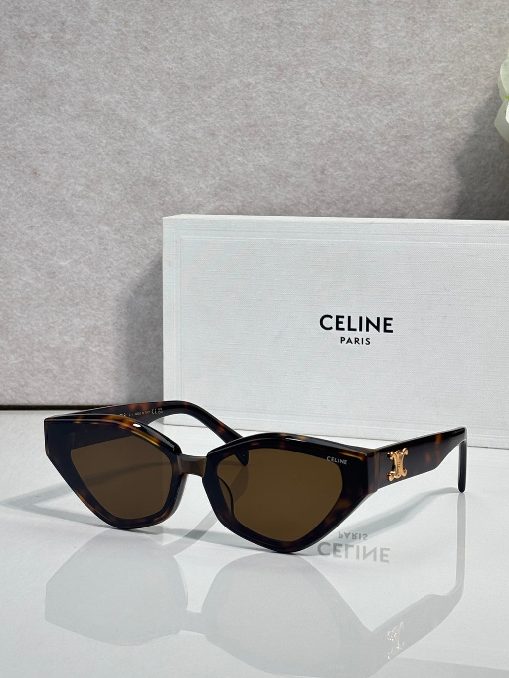 Celine cat-eye sunglasses with dark brown frames and tinted lenses