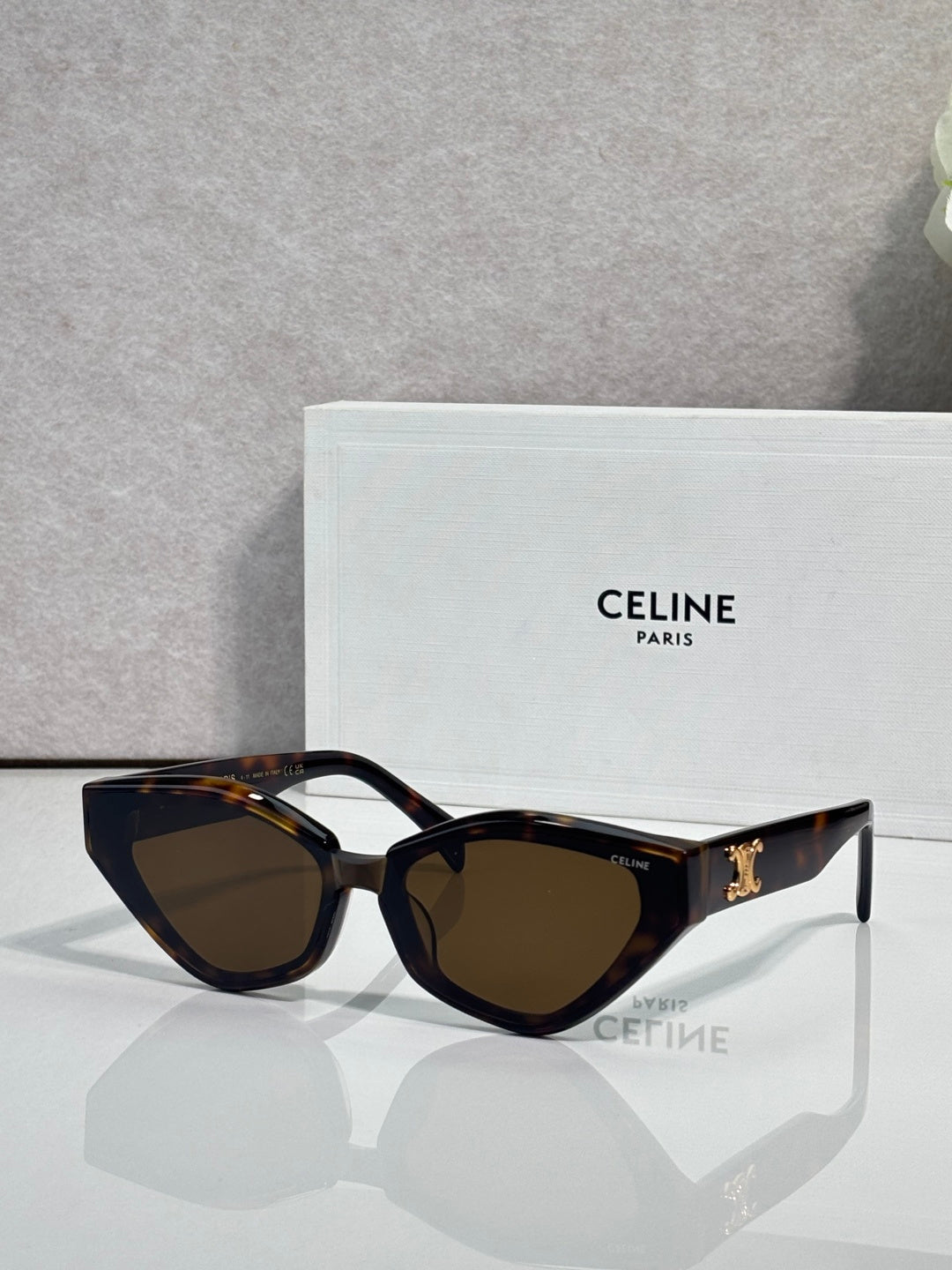 Celine cat-eye sunglasses with dark brown frames and tinted lenses