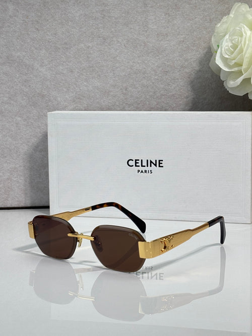 Celine sunglasses with tortoiseshell frames, dark lenses, and gold-tone logo arms