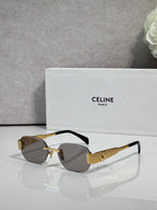 Celine sunglasses with tortoiseshell frames and dark lenses, gold-tone logo arms