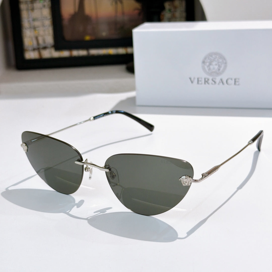 Versace sunglasses with dark gray lenses and silver-tone metal frame, cat-eye shape