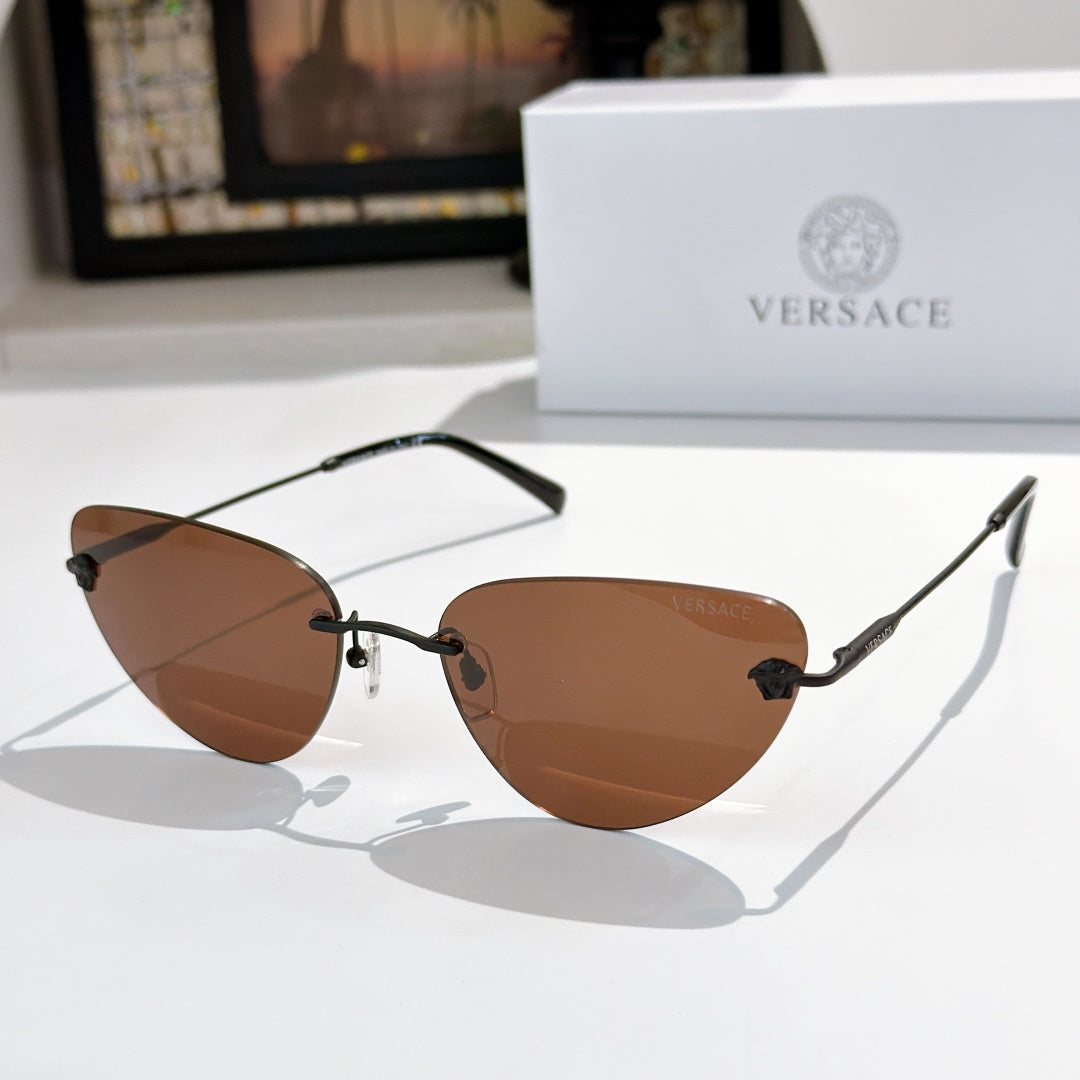 Versace sunglasses with warm brown lenses and dark frame, cat-eye style