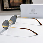 Versace sunglasses side view with dark lenses and gold frame, tortoise arms