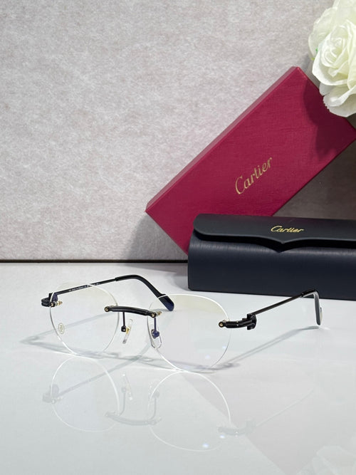 Metal eyeglasses with clear lenses, dark navy rim and gold detailing at hinges
