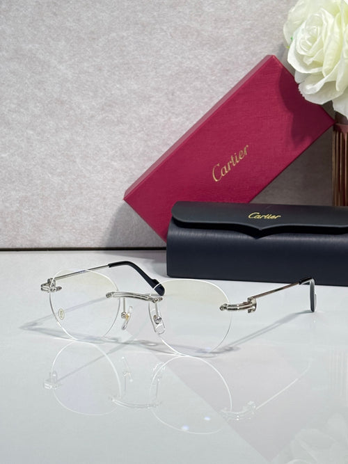 Metal eyeglasses with clear lenses and dark navy frame, gold logo temples