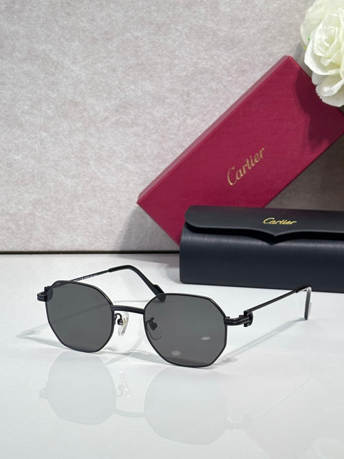 Cartier sunglasses with black metal frame and dark gray round lenses