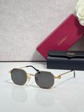 Cartier round sunglasses with gold-tone frame and dark lenses, full-rim style