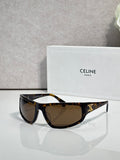 Celine tortoiseshell sunglasses with dark brown lenses and gold logo on temple
