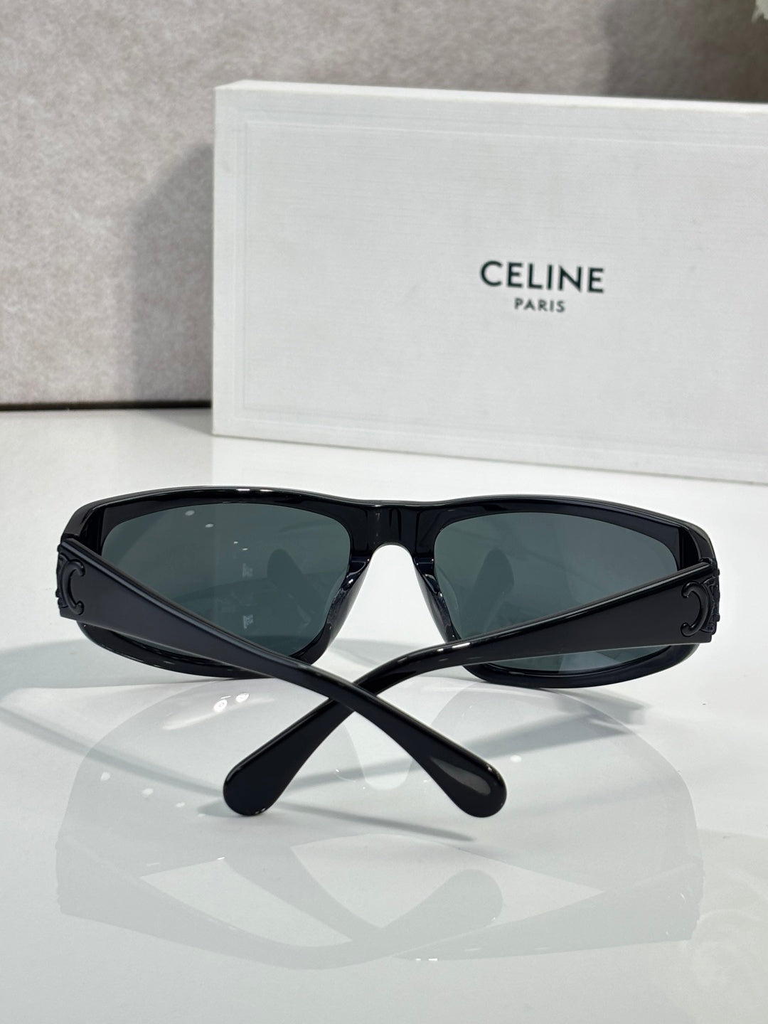 Celine sunglasses with dark frames and tinted dark green lenses, front view