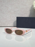 Dior light pink oval sunglasses with dark brown lenses and gold-tone detail