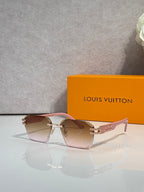 Louis Vuitton glasses with pink frames and light gradient lenses, gold logo hardware