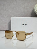 Square sunglasses with gold-tone frame and amber gradient lenses