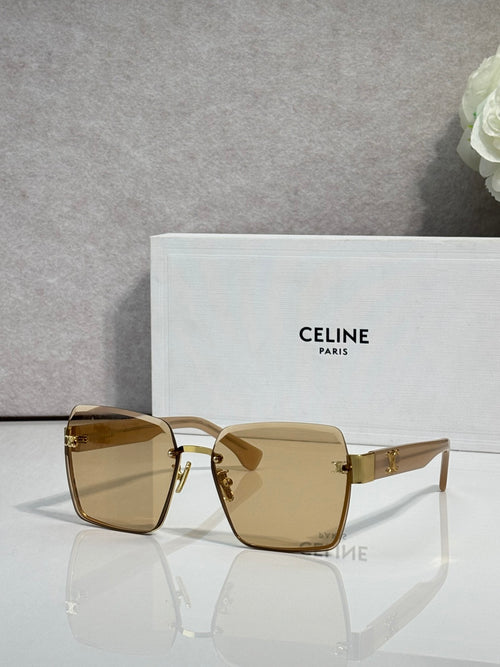 Square sunglasses with gold-tone frame and amber gradient lenses