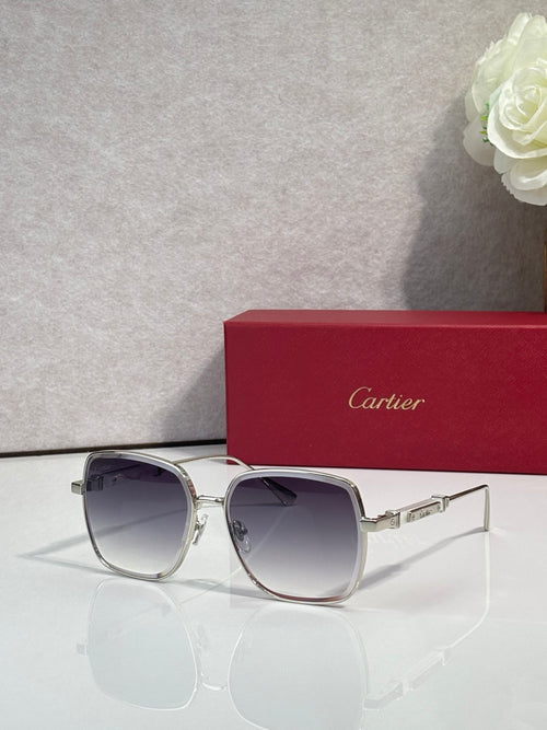 Cartier sunglasses with silver frame and dark navy tinted lenses