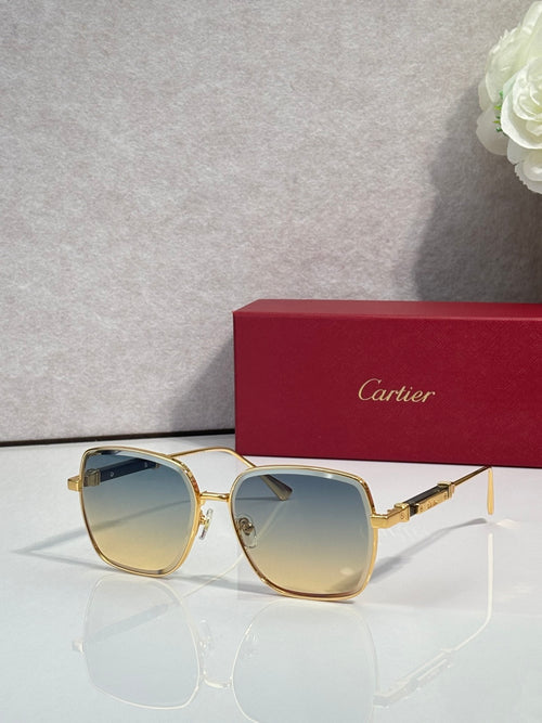 Cartier sunglasses with gold frame and gradient blue tinted lenses