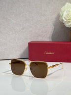 Cartier sunglasses with gold frame and brown tinted lenses