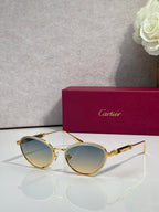 Gold-tone round sunglasses with light blue lenses