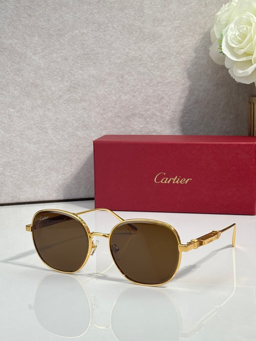 Cartier round sunglasses with gold frame and dark tinted lenses