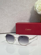 Silver-tone round sunglasses with dark tinted lenses