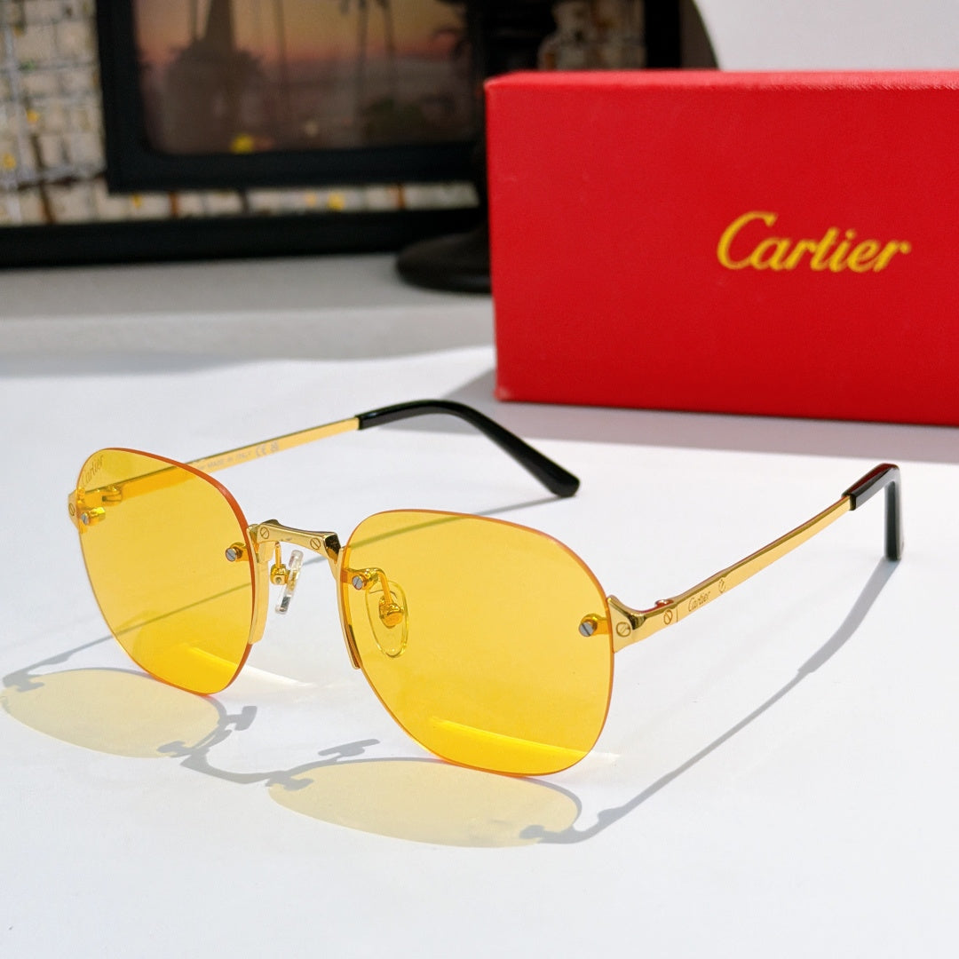 Gold-tone sunglasses with yellow lenses and black temple arms.