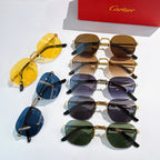 Assorted sunglasses with mixed gold frames and tinted lenses in blue, brown, and green.