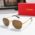 Gold-tone sunglasses with brown tinted lenses and black temple arms.