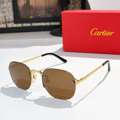 Gold-tone sunglasses with brown tinted lenses and black temple arms.