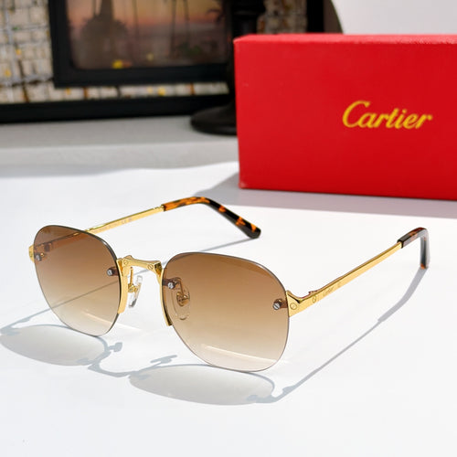Gold-tone sunglasses with light brown lenses and tortoiseshell accents.