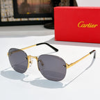 Gold-tone sunglasses with dark gray lenses and black temple arms.