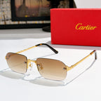 Cartier sunglasses with gold frame, black-accent arms, tan tinted lenses
