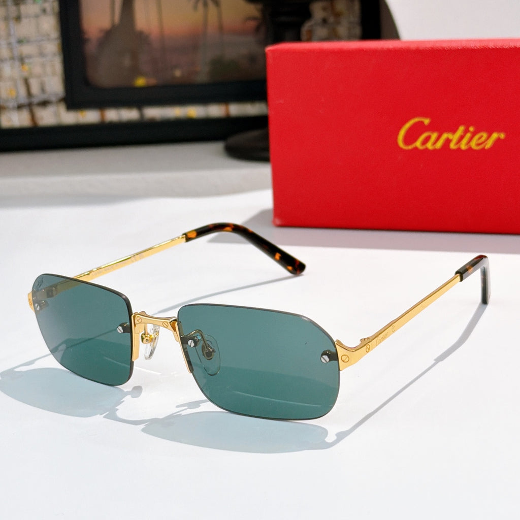Cartier sunglasses with gold frames, black-accent arms, green tinted lenses