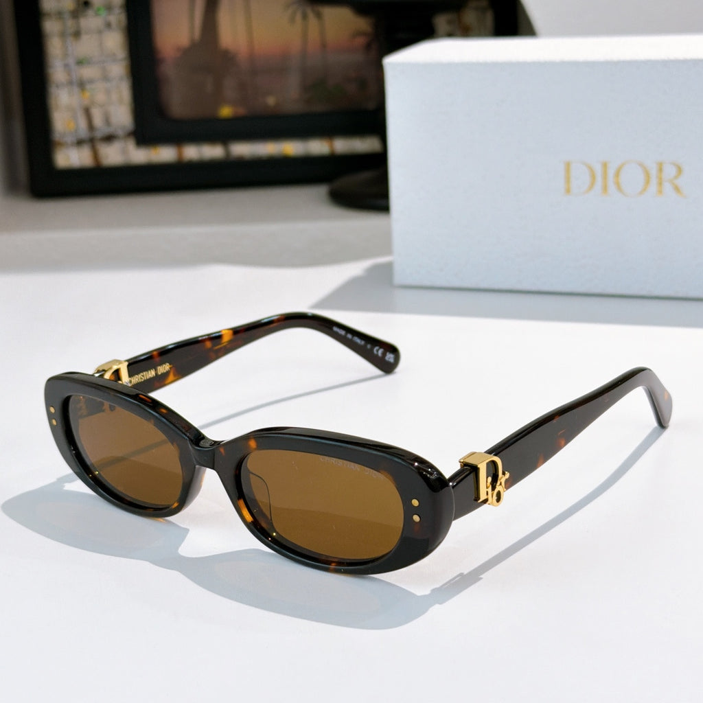 Dior sunglasses, dark tortoise frames with amber tinted lenses