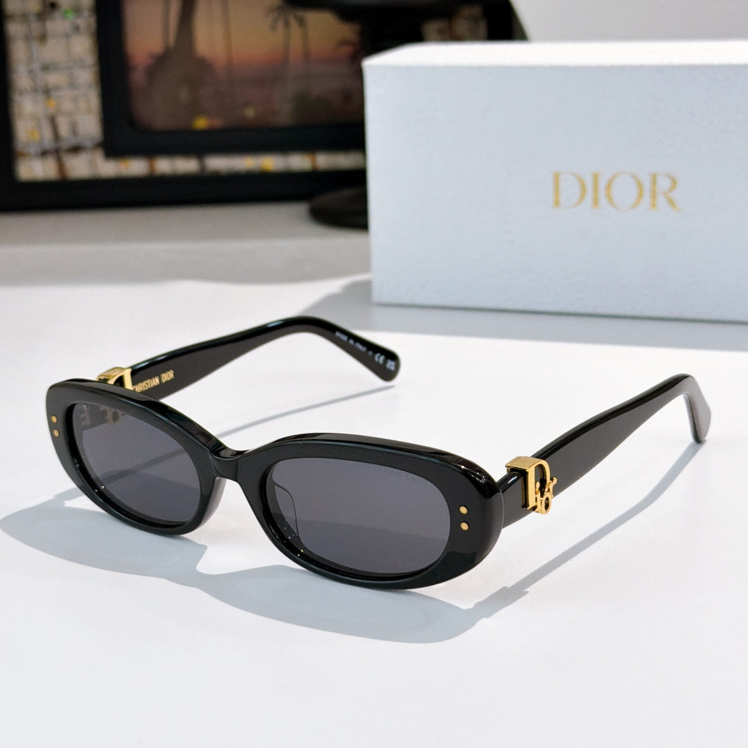 Sunglasses with black frames and deep dark tinted lenses