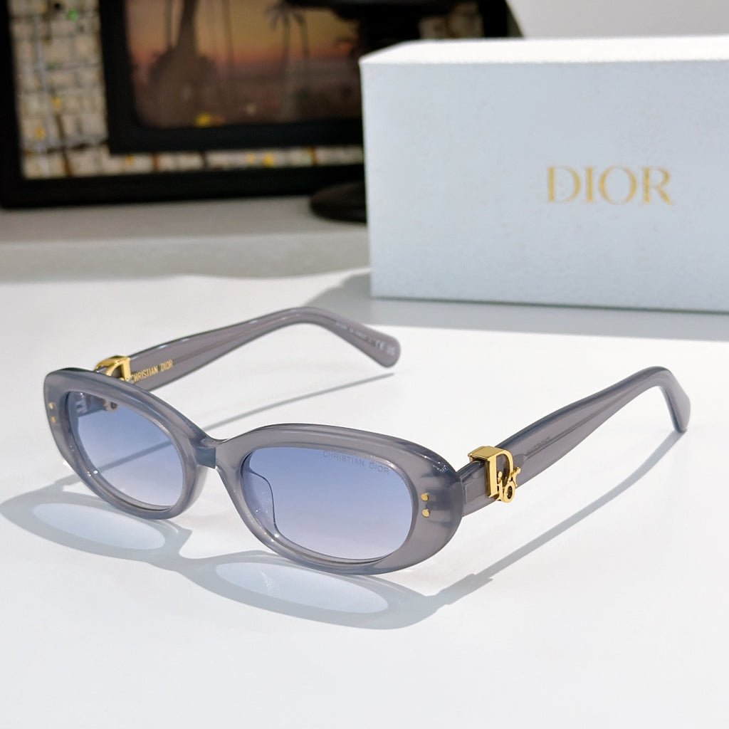 Sunglasses with pale blue frames and blue-tinted lenses