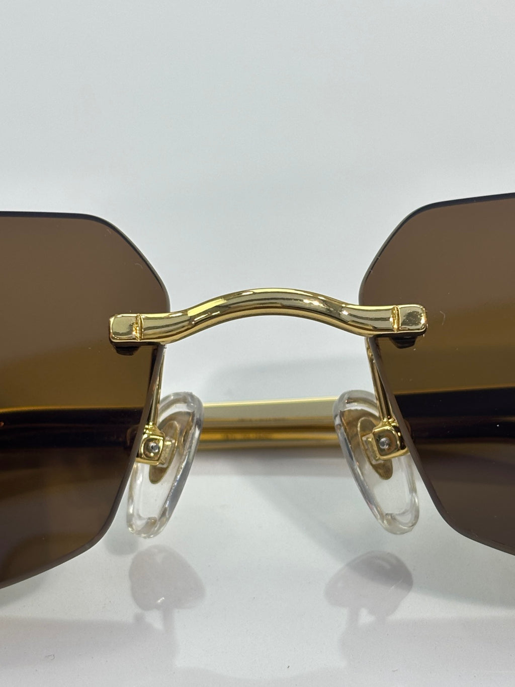 Cartier gold-tone sunglasses front frame with clear side arms