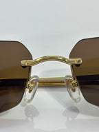 Cartier gold-tone sunglasses front frame with clear side arms