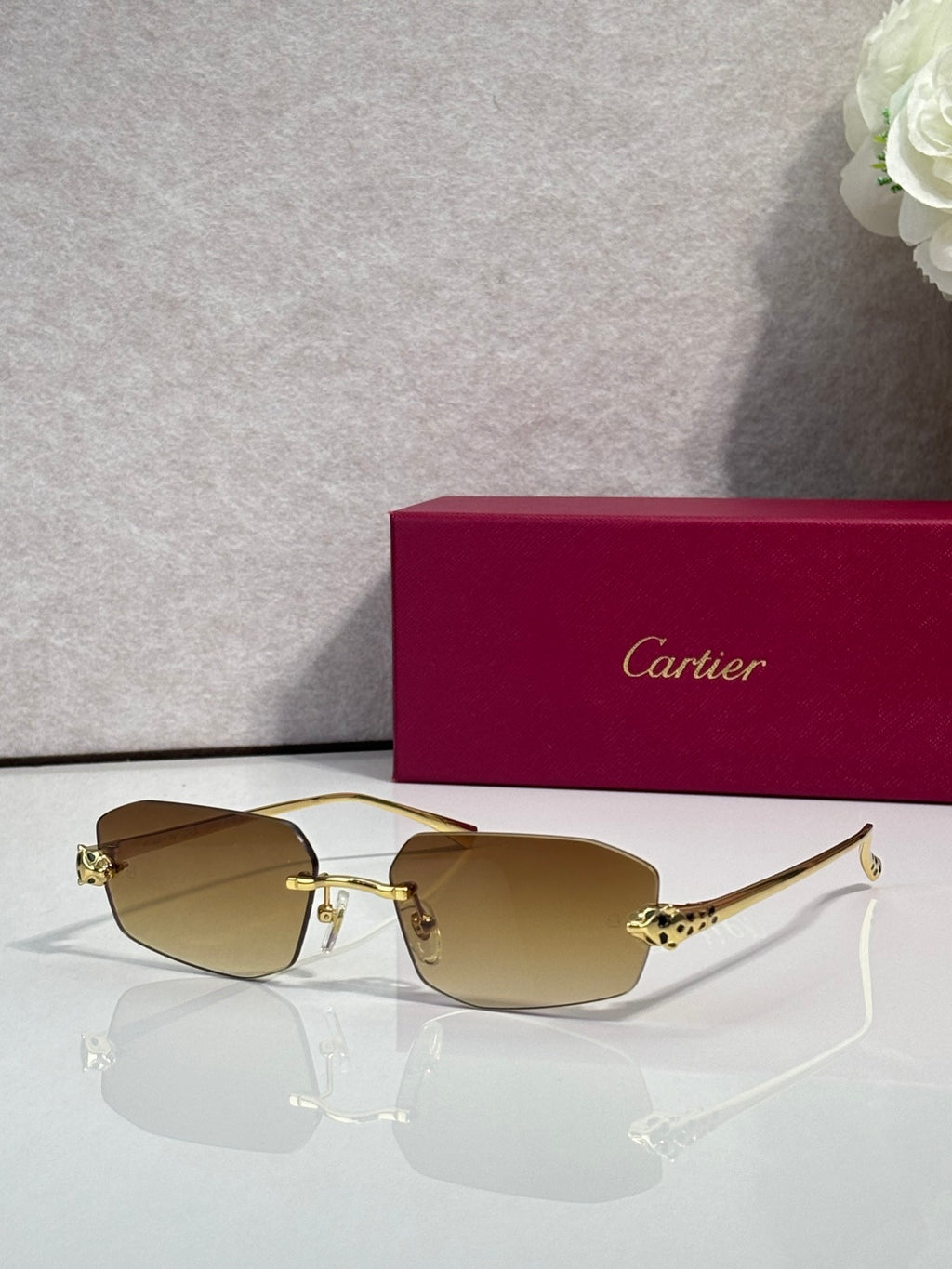 Cartier gold-tone hexagon sunglasses with tan lenses