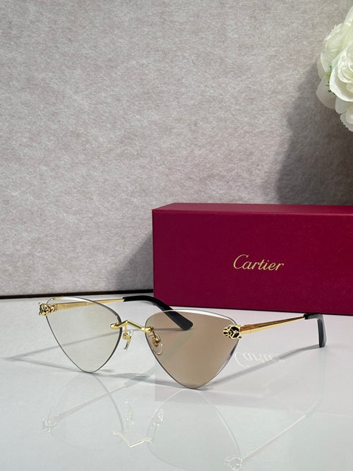 Cartier gold metal eyeglasses with black temples, reflective tinted lenses, cat-eye style