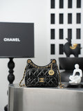 Chanel quilted black bag with gold chain strap and CC flap logo
