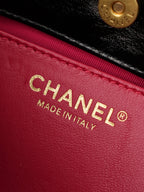 Chanel Made in Italy on red fabric lining inside the bag